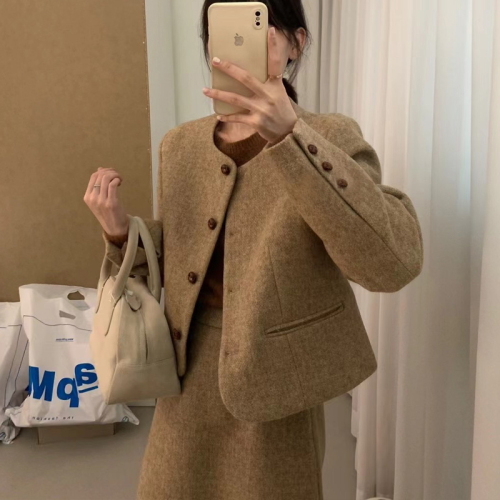 Woollen tweed featherdown suit with a sophisticated, slimming and chic designer vibe, tailored for a discerning, fashion-forward crowd.