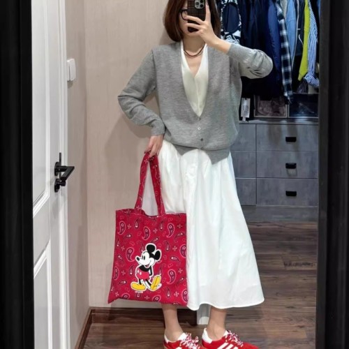 Gray fake two-piece contrasting color splicing long-sleeved sweater women's early autumn new cardigan loose slimming soft waxy top