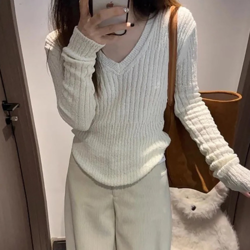 Small knitted long-sleeved dress for women autumn and winter 2024 new French style pure lust hot girl hip skirt