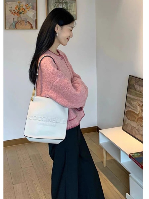 High-end pink round-neck woolen coat for women in autumn and winter, loose, gentle, sweet and chic, trendy color-blocked top