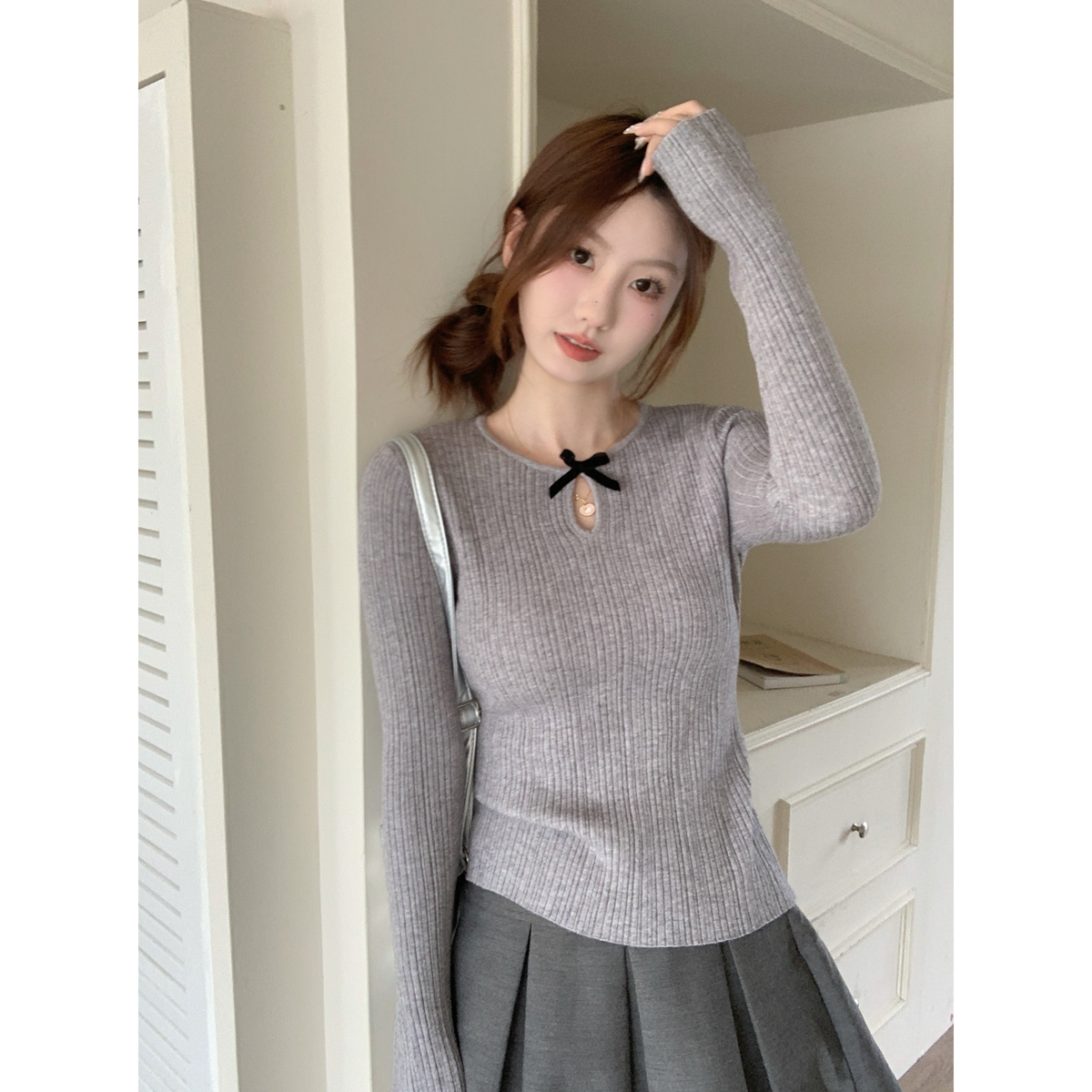 Real shot of autumn and winter Korean style slim-fitting hollow bow Andy velvet sweater bottoming long-sleeved sweater top