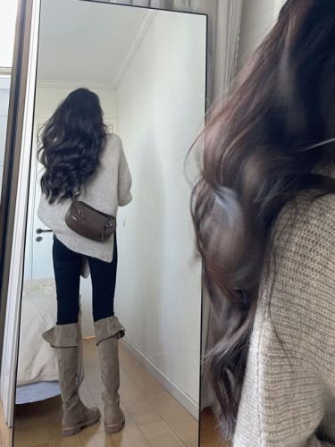 Irregular turtleneck sweater for women in autumn and winter new style gentle Korean style lazy style thickened knitted top