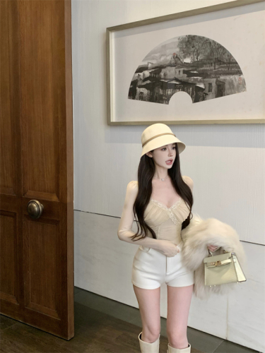 Real shot of a sweet girl with pure lust wearing a padded lace long-sleeved T-shirt with a top