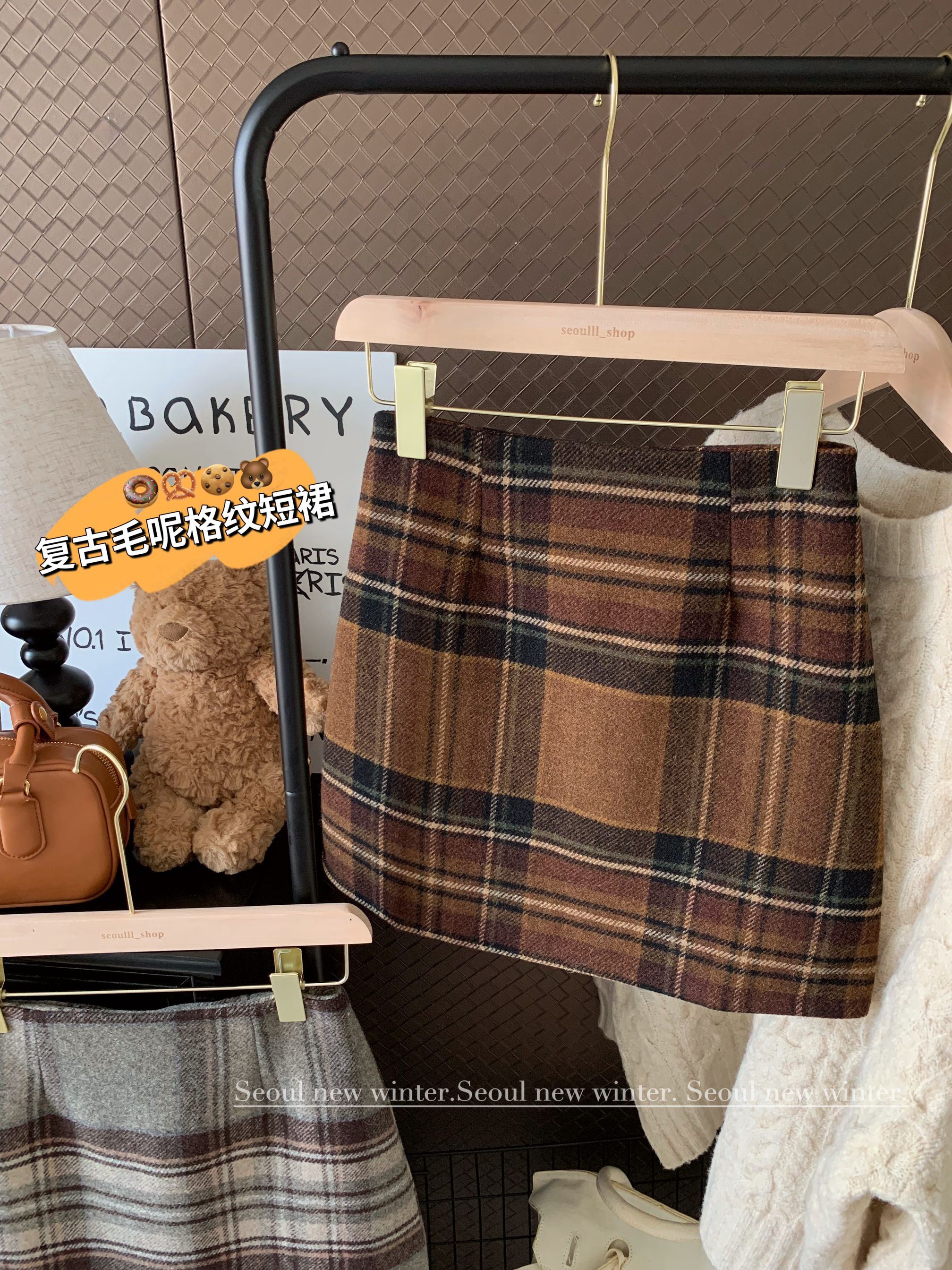 Photographed in 2024, versatile fabric half skirt with retro plaid, high-waisted and slimming A-line short skirt
