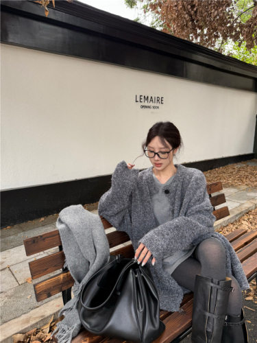 Actual shot of lazy, casual, loose retro sweater for women, versatile and stylish knitted sweater