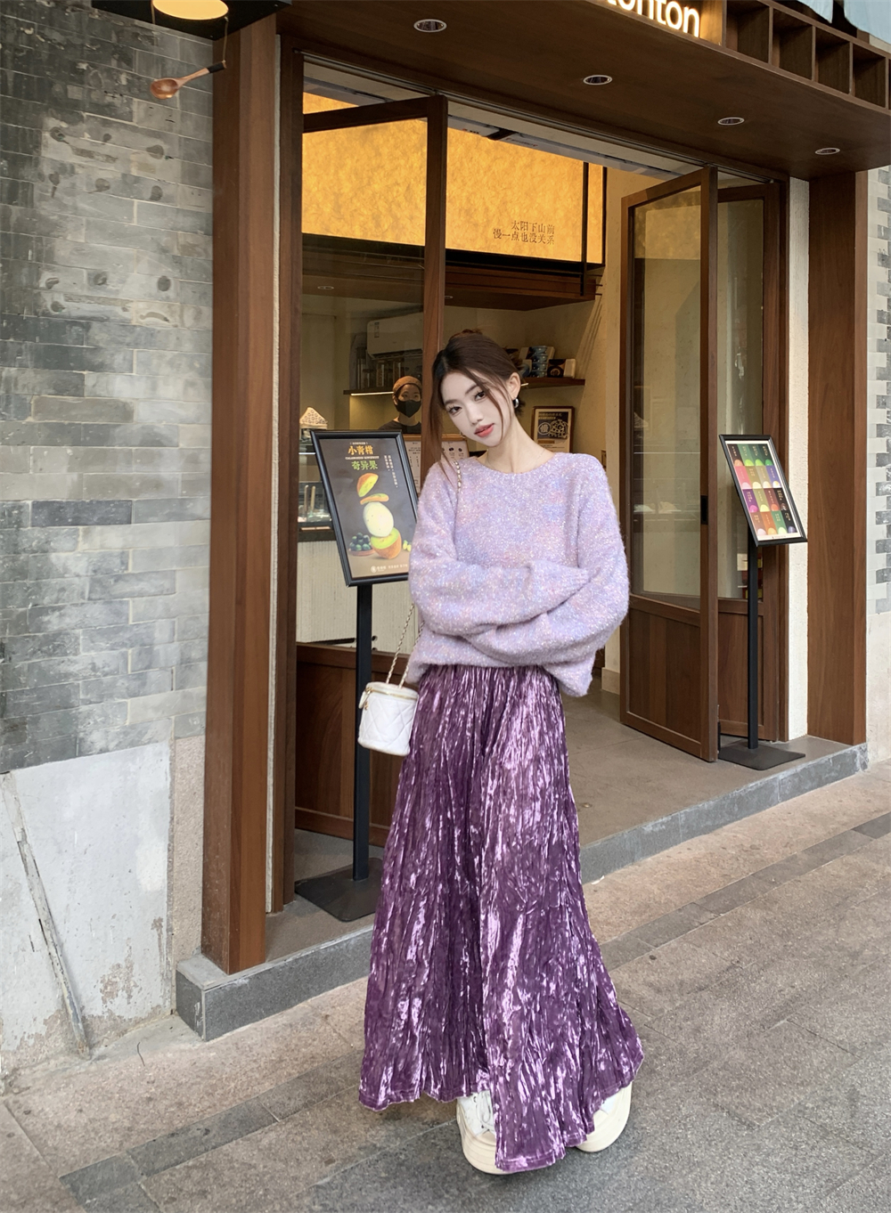 Custom hand-knitted warm sweater with winter-colored yarn + purple velvet midi skirt (shot with a camera)