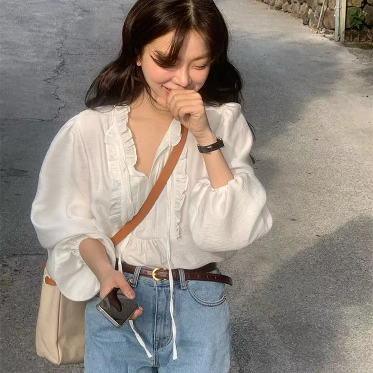 Korean chic autumn gentle temperament V-neck tie splicing wood ear design puff sleeve loose solid color shirt