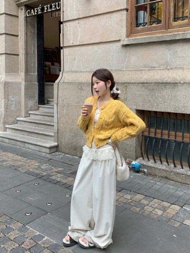 Real shot of retro soft waxy round neck long-sleeved twist sweater + lace stitching slimming bottoming shirt + corduroy wide-leg pants