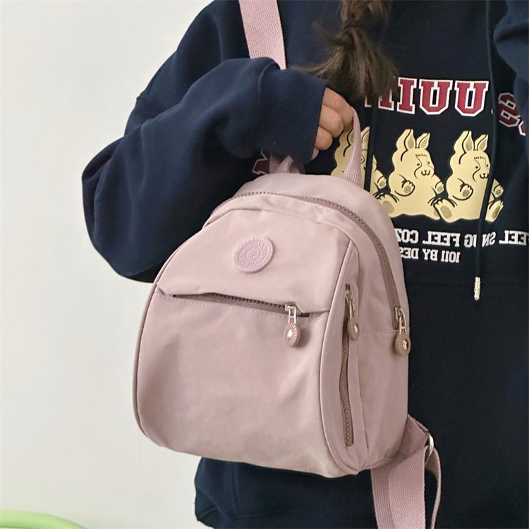 Mini small bag women's bag new fashion versatile canvas college student commuting shopping backpack casual school bag