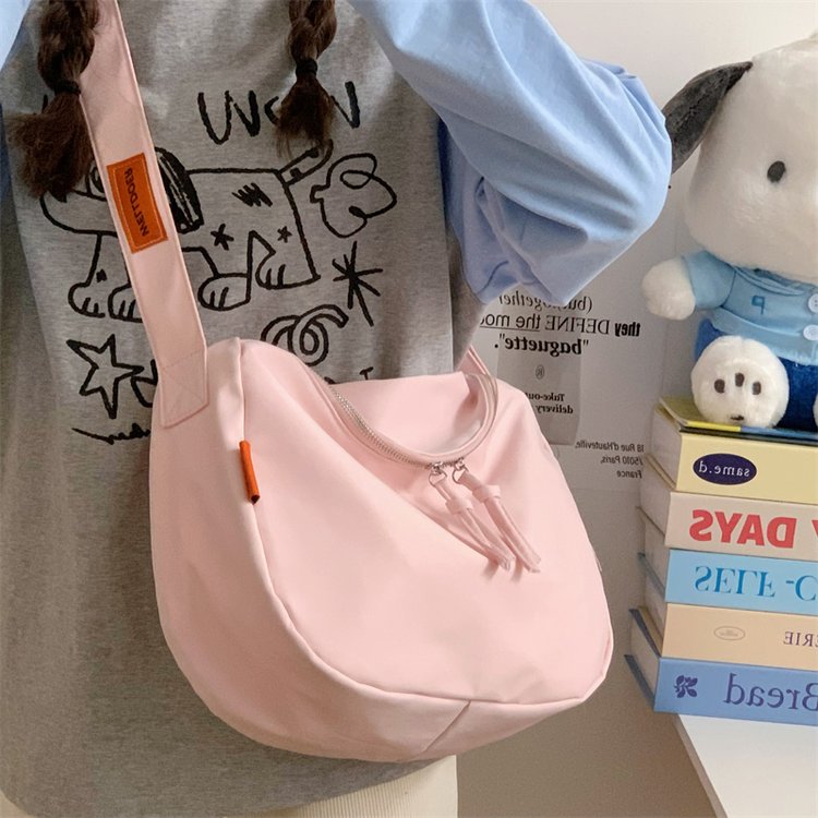 Japanese ins simple versatile crossbody bag for women large capacity student class bag commuter backpack casual dumpling bag