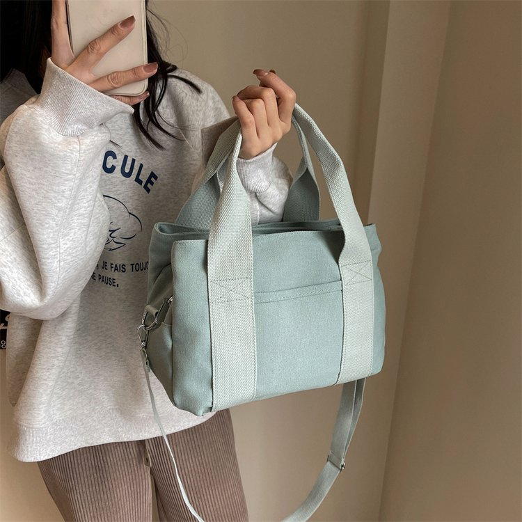 Cross-border direct supply hot-selling Japanese Korean version high-end canvas bag lunch bag handbag 16 An canvas women's bag hand bag