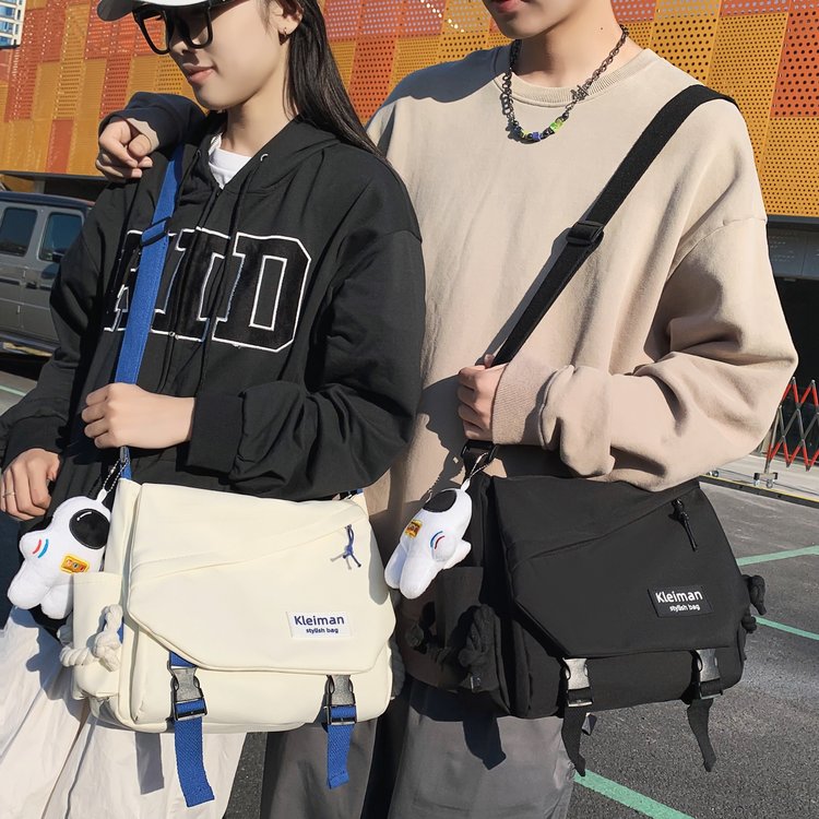 Simple male student casual crossbody bag, fashionable Korean canvas shoulder bag, computer bag, couple backpack, new wholesale
