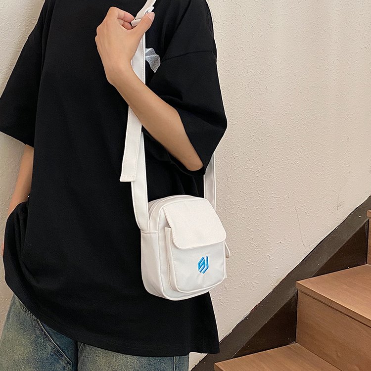 Textured mobile phone bag for men and women, trendy one-shoulder solid color small bag, student backpack, casual personalized coin key small shoulder bag