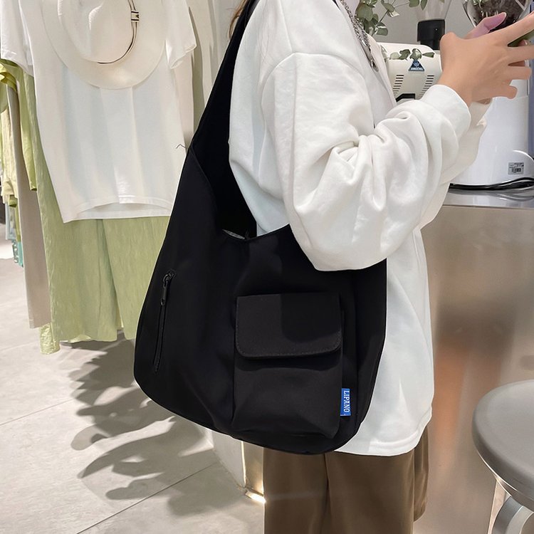 Canvas bag women's new versatile niche texture large capacity tote bag student fashion single shoulder armpit bag