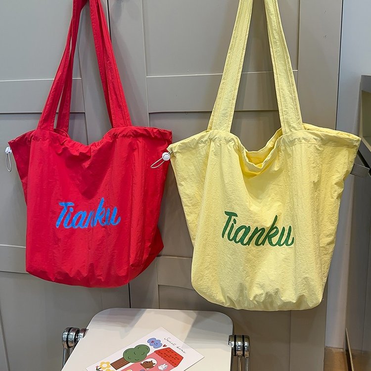 New Korean style ins letter simple drawstring shoulder bag for women large capacity drawstring portable tote bag tutoring bag