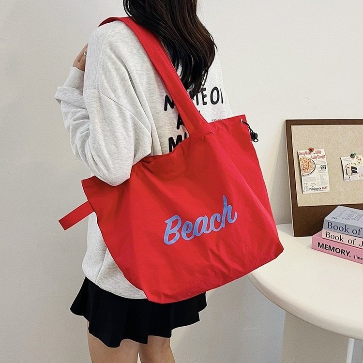 Korean ins letter printed nylon bag casual versatile shoulder bag portable drawstring large capacity tote bag