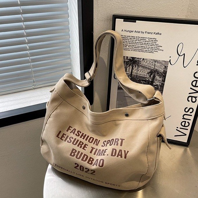 New portable letter canvas tote bag, large capacity student shoulder crossbody bag, fashionable and versatile commuter bag for women