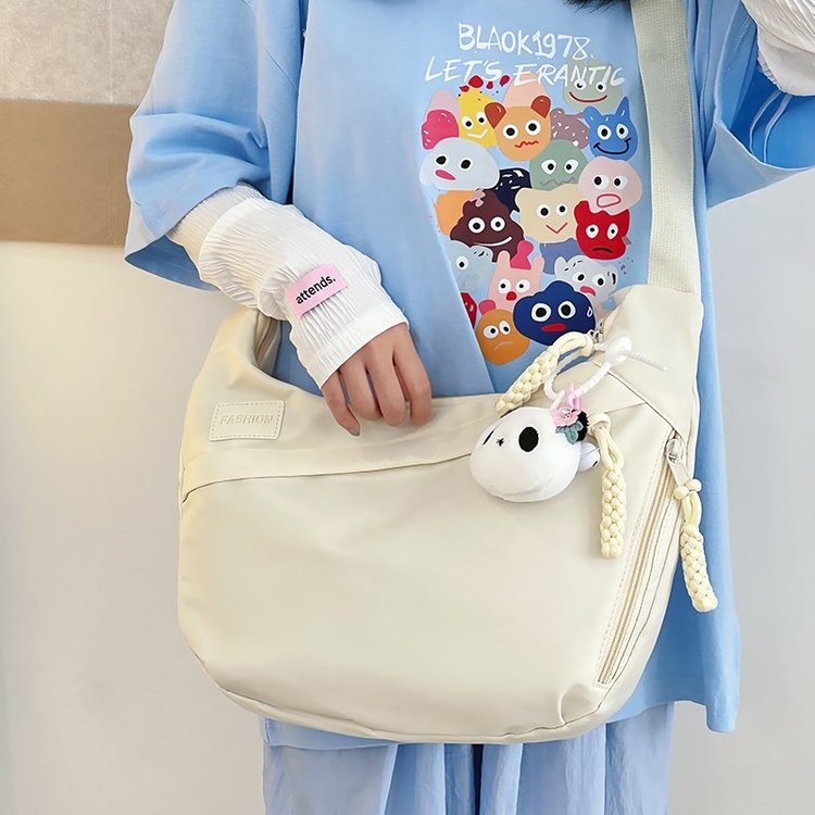 New spring and summer style dumpling bag for women, casual and versatile girly crossbody bag, versatile solid color commuter shoulder bag