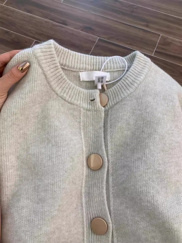 Designed single-breasted solid color knitted sweater jacket cardigan lazy loose round neck autumn and winter top