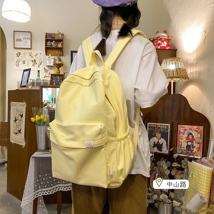 ins Japanese girl schoolbag female Korean version junior high school student cute solid color backpack high school student large capacity
