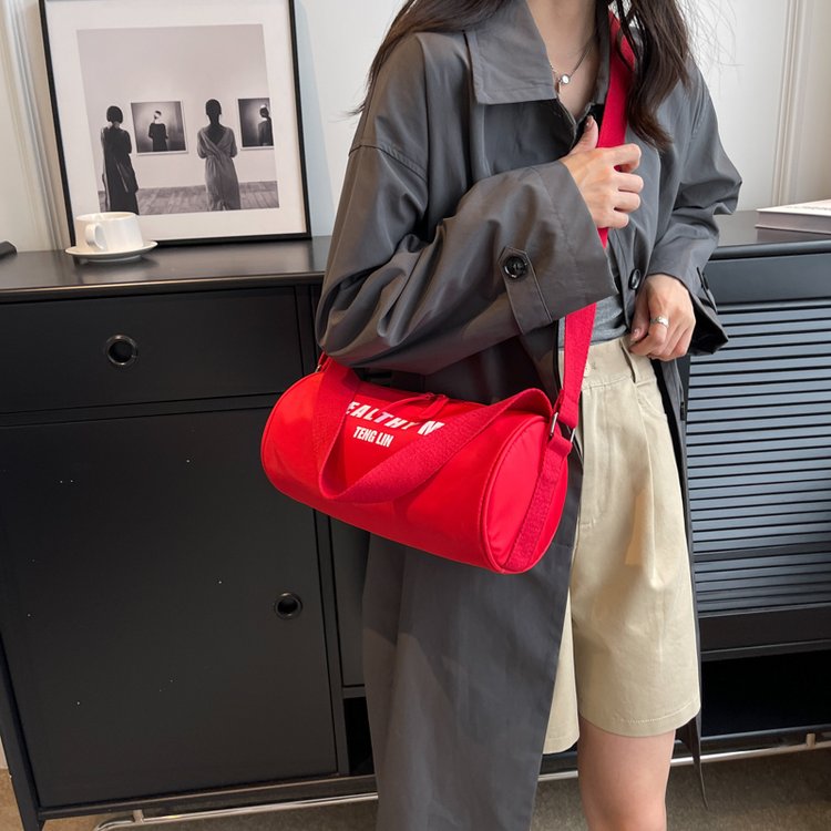 Red niche design cylindrical bag Japanese style ins letter trend casual retro messenger bag commuter small bag for women