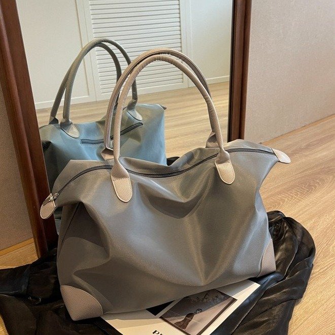 Large-capacity travel bag Korean style business trip luggage bag storage baby bag sports fitness bag short-distance portable handbag