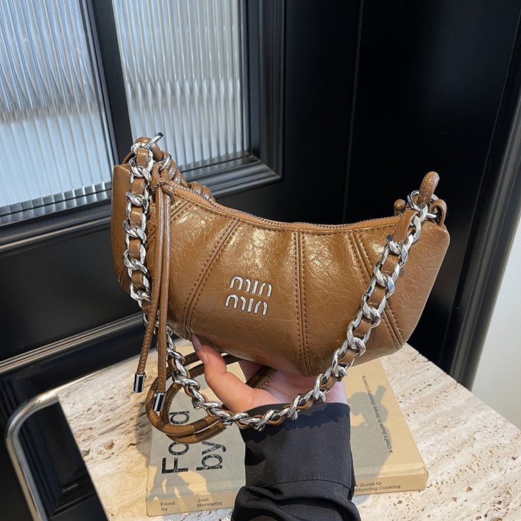 High-end texture retro croissant bag crossbody women's bag 2024 new niche fashion simple single shoulder handheld armpit bag