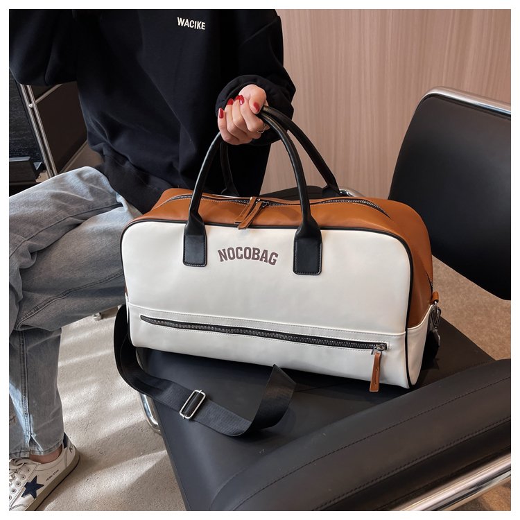 Hand-held travel bag for women, new Korean version, simple large-capacity crossbody storage bag, portable travel luggage bag