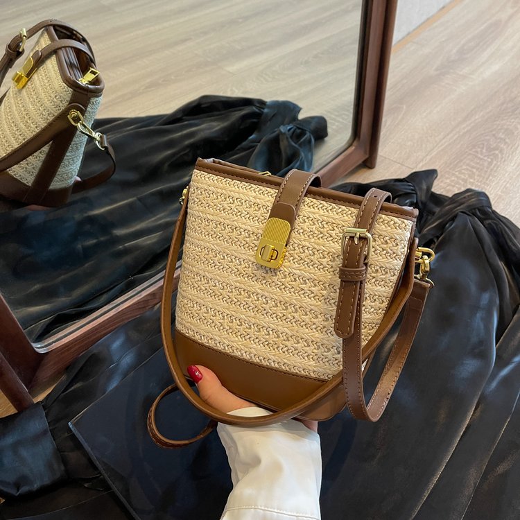 Woven straw bag women's new niche design crossbody bag summer versatile high-end portable bucket bag