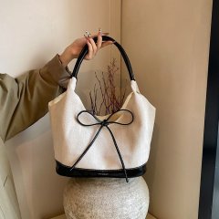 Korean niche stitched canvas tote bag for women 2024 new commuter fashion handbag versatile shoulder armpit bag