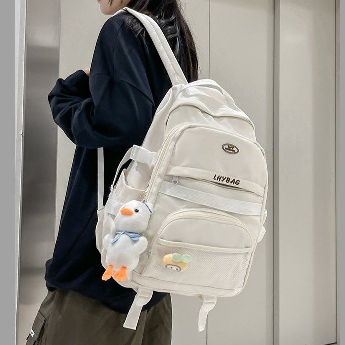 2024 new Korean ins college student backpack female high school student computer simple versatile school bag travel backpack