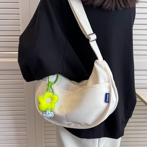 Large-capacity canvas dumpling bag women's Japanese new versatile shoulder bag fashion flower postman bag messenger bag