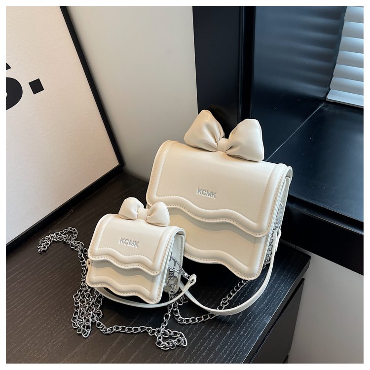 2024 new fashion trend bow shaped children's parent-child hand-carrying cross-body mobile phone lipstick bag women's bag