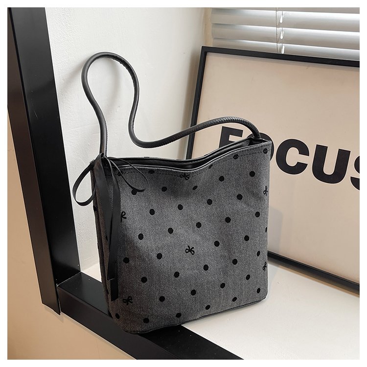 Women's bag 2024 spring and summer new style simple fashion trend bucket bag niche plaid bow design crossbody bag