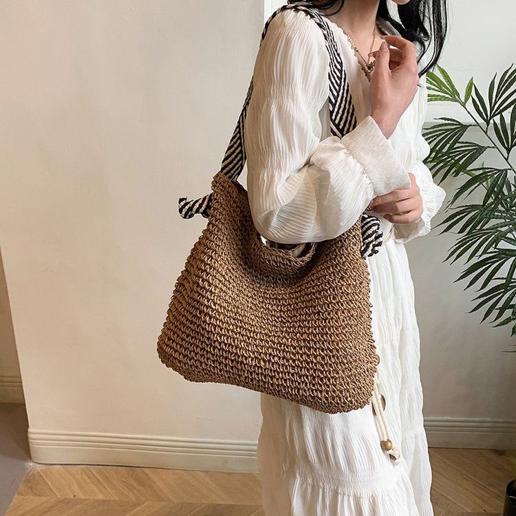 Korean style ins navy straw woven bag 2024 new handmade shoulder woven bag women's bag versatile vacation beach bag