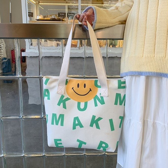New women's bag Dongdaemun South Korea cartoon casual letter smiley canvas bag hand shoulder bag tote bag