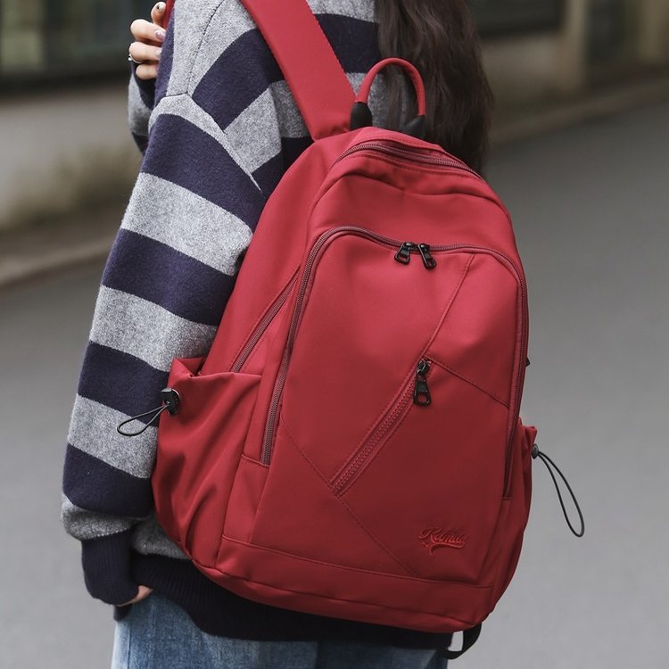 Korean version of the new large-capacity backpack for men and women outdoor leisure backpack large-capacity middle and high school student schoolbag manufacturer
