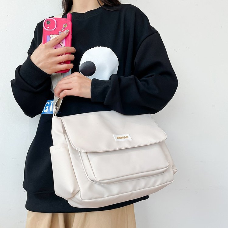Japanese retro solid color canvas bag niche design casual versatile shoulder bag lightweight waterproof burden-reducing crossbody bag