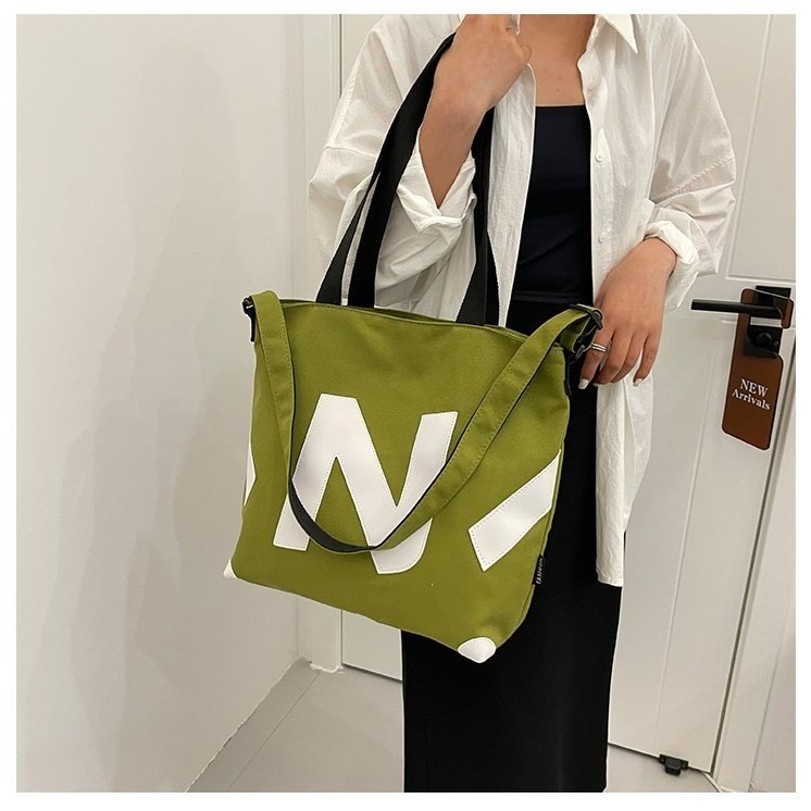 2023 New Canvas Bag Women's Ins Style Japanese Student Bag Simple Literary Messenger Bag Shoulder Women's Bag Tote