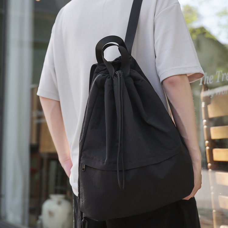Niche drawstring backpack men's casual school bag women's lightweight outdoor cycling backpack drawstring pocket mountaineering travel bag men