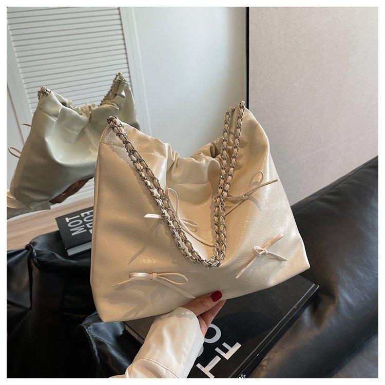 ins bag women super hot bow decoration glossy PU armpit bag fresh and simple large capacity chain shoulder bag