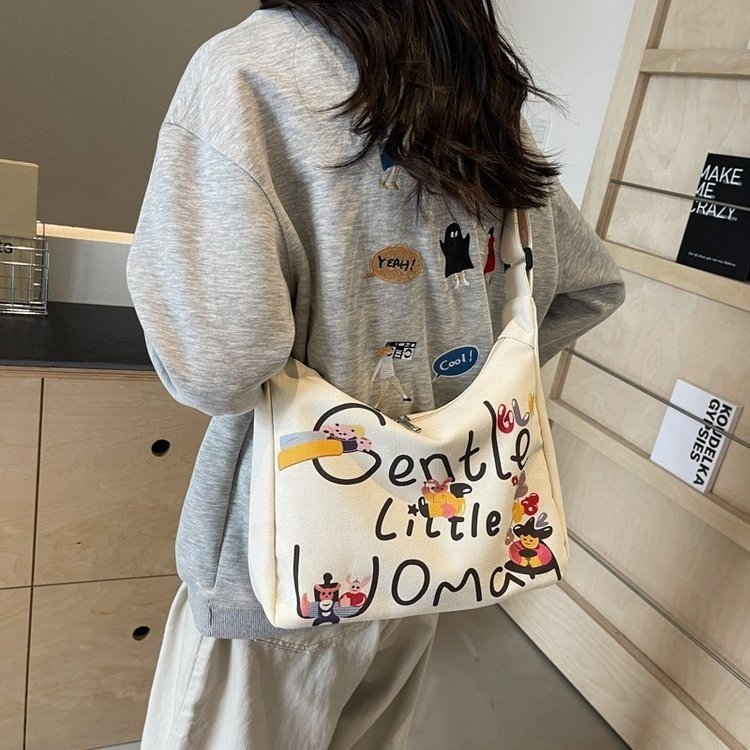 Gentle Woman casual cartoon printed letter canvas bag 2023 new texture painted shoulder bag