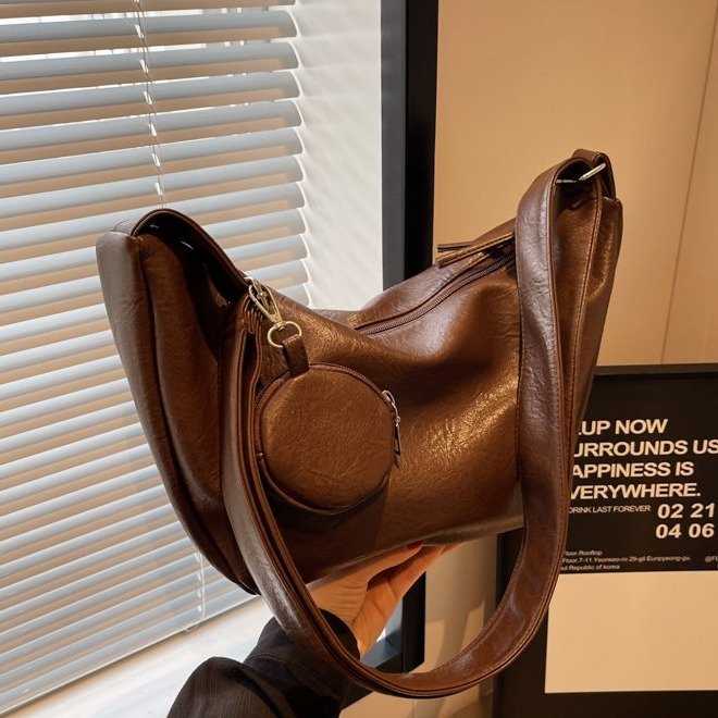 Bag niche design one-shoulder cross-body dumpling bag simple casual student bag shopping bag versatile Korean version PU bag