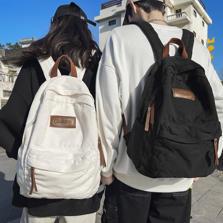 Washed canvas schoolbag female college high school junior high school ins Japanese simple large capacity travel backpack male