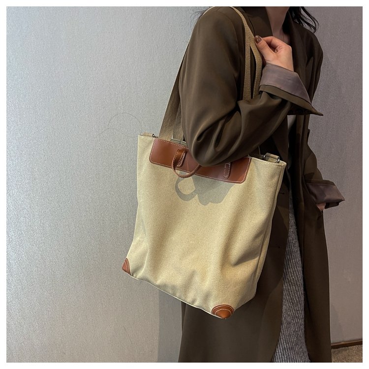 Canvas bag women's large capacity new fashion versatile autumn and winter shoulder bag portable commuting bucket tote bag