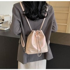 Fashionable simple restraint drool bucket bag women's new niche design chain backpack commuter shoulder crossbody bag