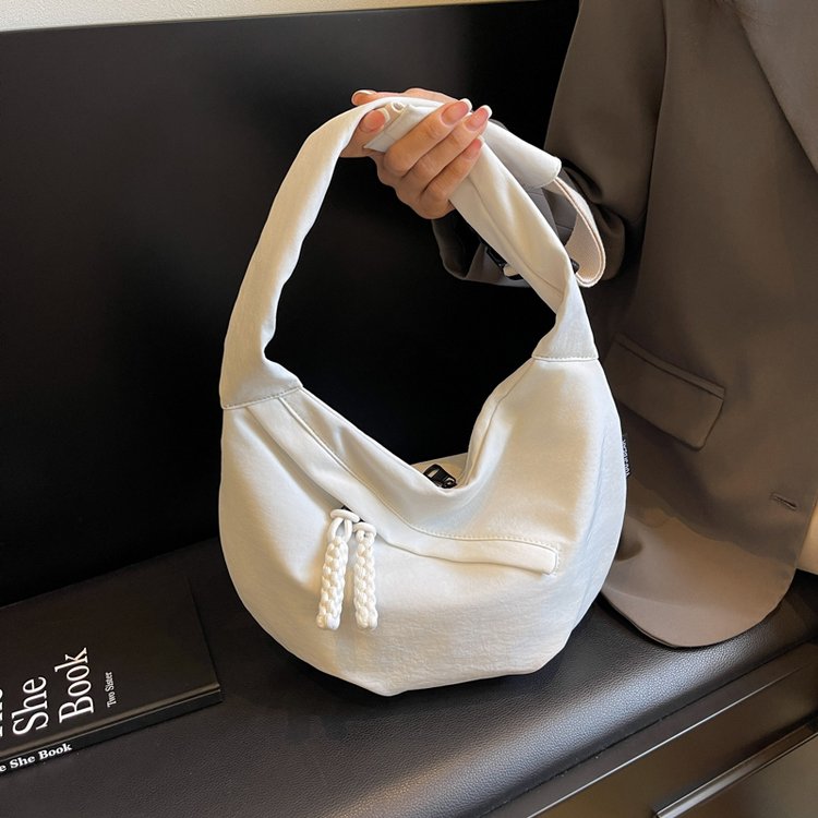 Solid color large capacity canvas bag women's new casual commuter shoulder bag lightweight Ruiying nylon crossbody dumpling bag