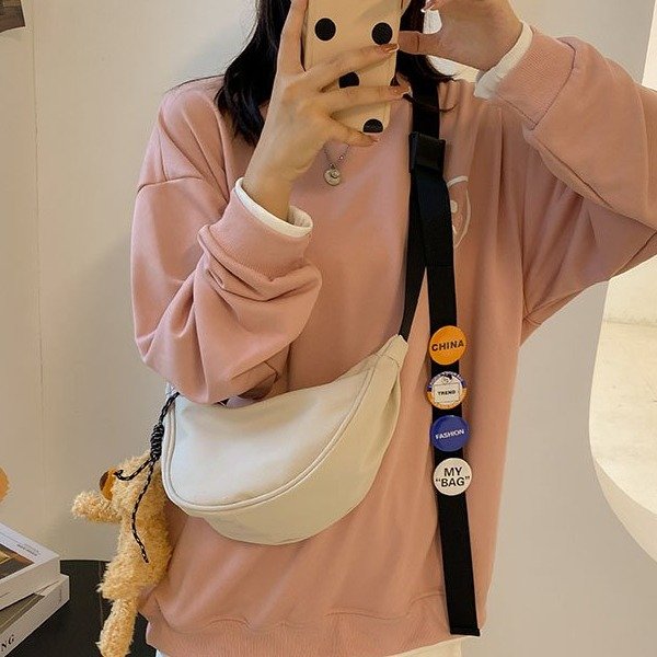 Canvas bag women's 2024 new sports nylon dumpling bag travel saddle bag casual versatile crossbody small bag trendy