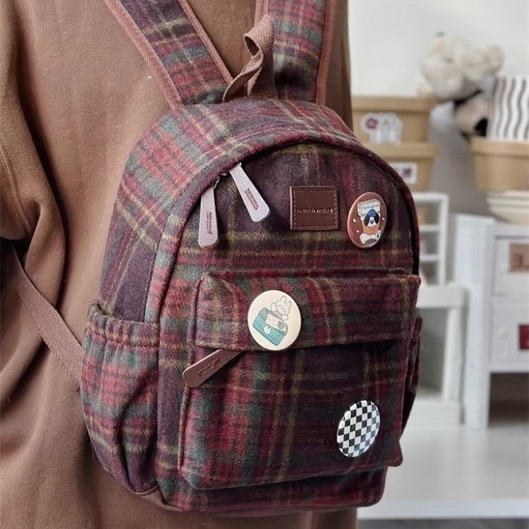 College style retro woolen schoolbag for junior high school students 2024 autumn and winter Korean version versatile ins plaid commuter backpack