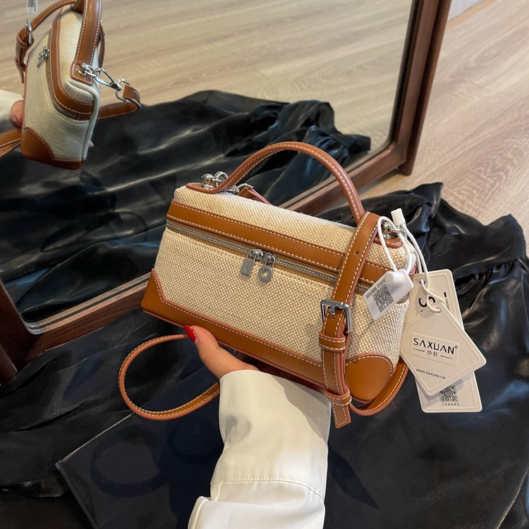 Canvas bag women's new niche design high-end autumn and winter crossbody bag Internet celebrity hot style portable bucket bag